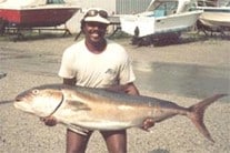 Past president, Charles Randolph with a big amberjack.
